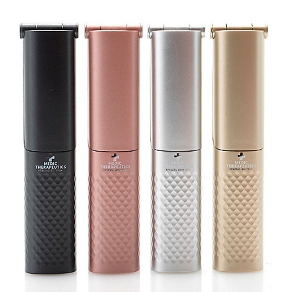 Portable Sterlizing Wand by Medic Therapeutics in Gold Tone